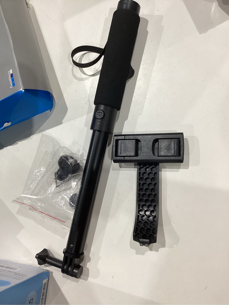 Condition photo showing As Is for onn bluetooth selfie stick – extendable to 40 in 360° rotating & tilting clamp with built-in rechargeable shutter and universal camera mount