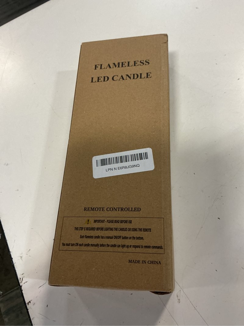 Condition photo showing New/Like New for stmarry black flameless taper candles with remote and timer - 9.65 inch real wax led candlesticks - wax drip battery operated halloween taper candles with 3d flickering flame halloween decor, 6 pack black 6 pack