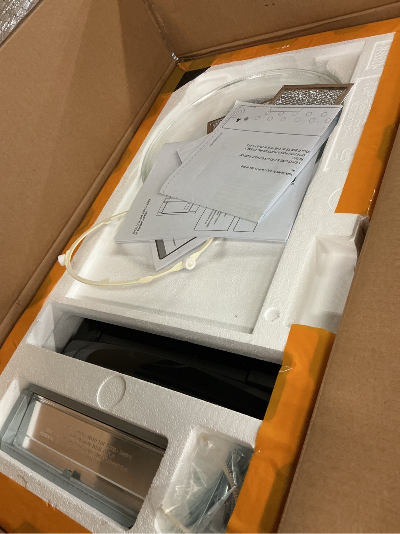 Condition photo showing As Is for BLACK+DECKER Over the Range Microwave Oven with Vent and One-Touch Auto Cooking, 1.7 cu. ft. OTR Over Stove Microwave, Black, 1000 Watts, EM044K6CF-BK 1.7 Cu.Ft Black