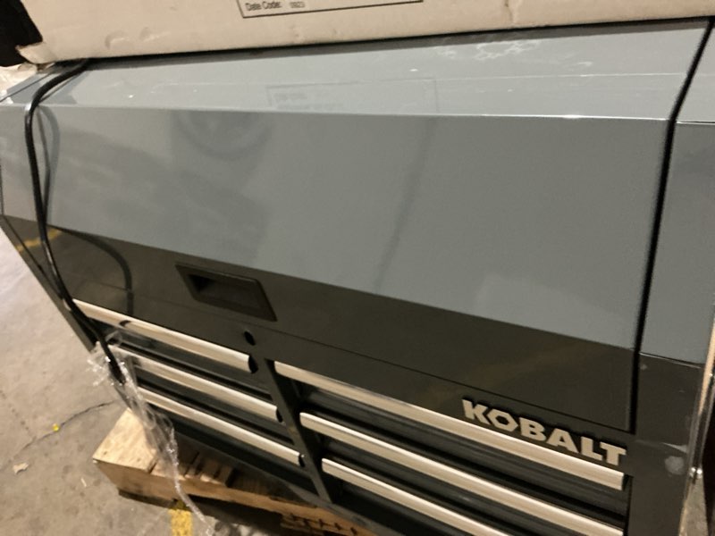 Condition photo showing As Is for kobalt 36-in w x 38-in h metal rolling tool cabinet ( gray )