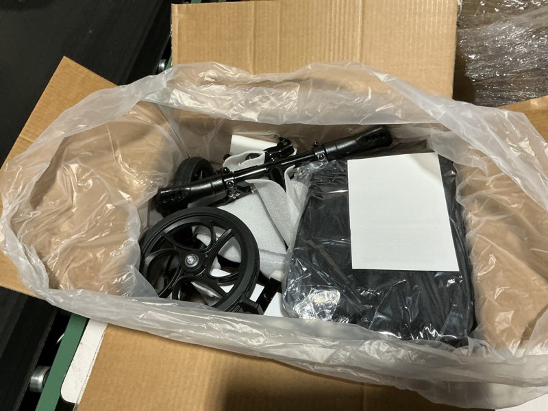 Condition photo showing New/Like New for steerable knee walker deluxe medical scooter for foot injuries compact crutches, with dual rear on-wheel brake and shock absorption under the knee pad?purple?