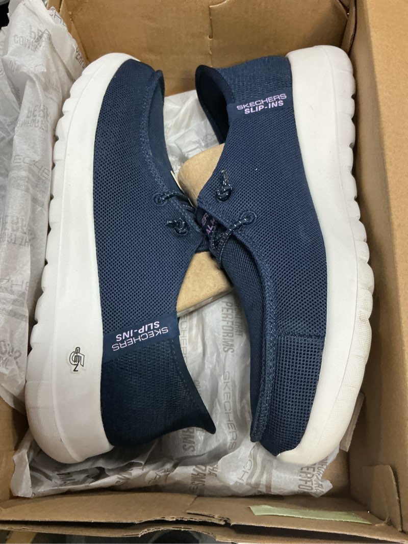 Condition photo showing As Is for skechers women's skechers women's hands free slip-ins go walk joy moc toe casual shoe 7 wide navy/lavender