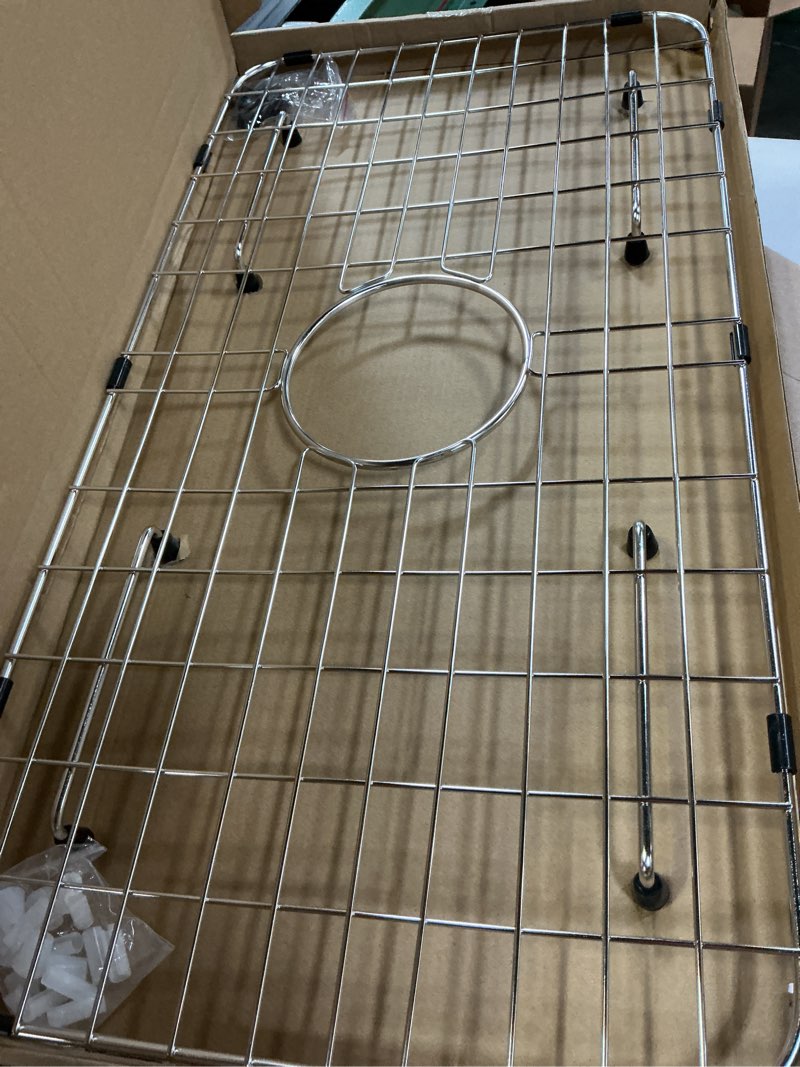 Condition photo showing Good Condition for sink bottom grid 24-1/8" x 12-5/8", centered drain with corner radius 1-1/2", sink protector for single bowl kitchen sinks 24-1/8" x 12-5/8" centered drain