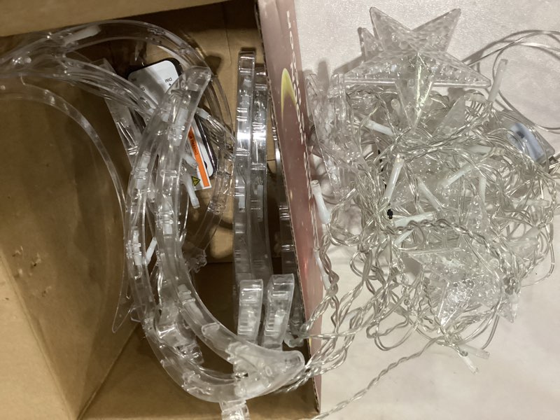 Condition photo showing As Is for FUNPENY Star Moon Curtain String Lights, 138 LED Window Lights with Remote Control, Warm White Fairy Lights with 8 Modes for Indoor, Wedding, Party, Bedroom, Patio Lawn, Ramadan Decorations