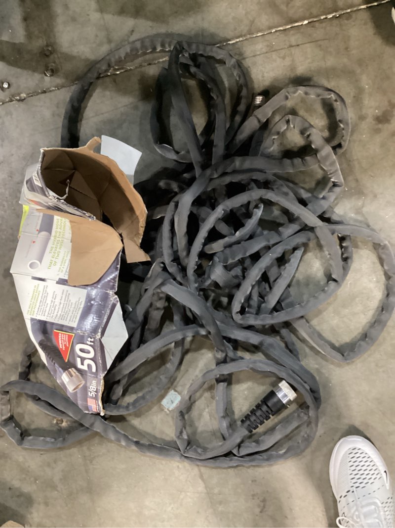 Condition photo showing As Is for teknor apex zero-g 5/8 in. d x 50 ft. l heavy duty commercial grade garden hose