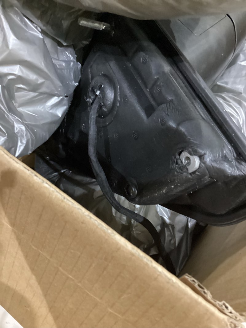 Condition photo showing As Is for passenger right side door mirror power and heated glass with signal light and blis puddle light manual folding textured back cover for ram 1500 from 2019 to 2024 passenger (rh) side