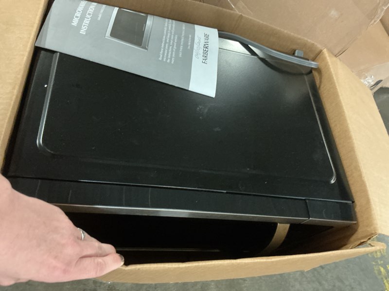 Condition photo showing As Is for Farberware 1.2 Cu. Ft. Countertop Microwave Oven – 1000 Watts Power, Smart Sensor Auto Cook Settings, Defrost, Easy Clean and Child Safety Lock - Stainless 1.2 Cu.Ft Stainless Steel