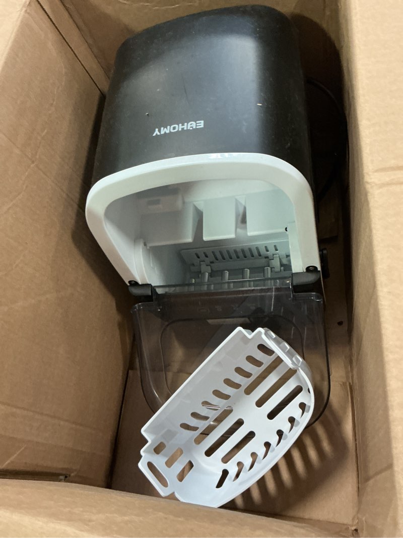Condition photo showing As Is for EUHOMY Countertop Ice Maker Machine with Handle, 26lbs in 24Hrs, 9 Ice Cubes Ready in 6 Mins, Auto-Cleaning Portable Ice Maker with Basket and Scoop, for Home/Kitchen/Camping/RV. (Black) ICE MACHINE 11.57"D x 11.42"W x 8.74"H Black