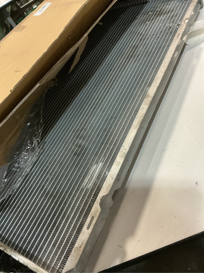Condition photo showing As Is for engine coolant radiator with transmission oil cooler for chevrolet k1500 5.7l 1994-1999, tahoe 5.7l 1995-2000, c1500 5.7l 1994-1999, k1500 suburban 5.7l 1994-1999, gmc yukon 5.7l 1994-2000 & more rad:1693