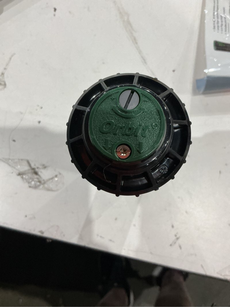 Condition photo showing As Is for orbit adjustable pop up gear drive sprinkler