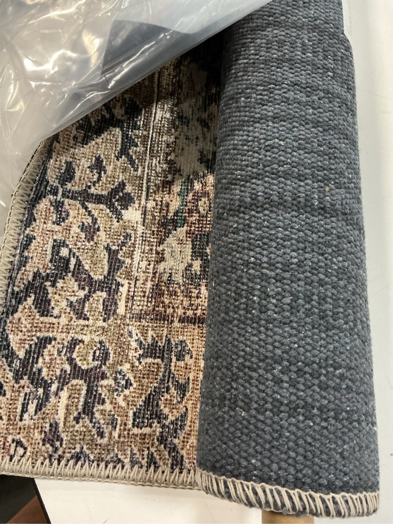 Condition photo showing Good Condition for Loloi Amber Lewis x Loloi Georgie Collection GER-05 Denim / Spice, 2'-0" x 5'-0", 0.19" Thick Accent Rug