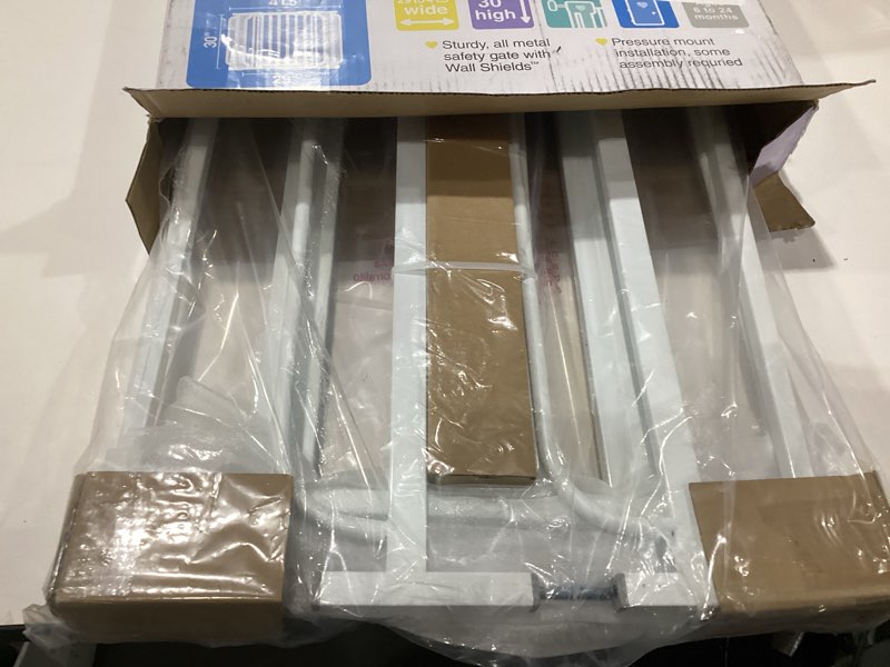 Condition photo showing New/Like New for regalo safety 29-38.5" baby gate for doorways & bottom of stairs, pressure mounted baby gate with door for babies, toddlers & pets, tested & safe for 30 years, american designed, american owned, white white 29-38.5"w x 30"h