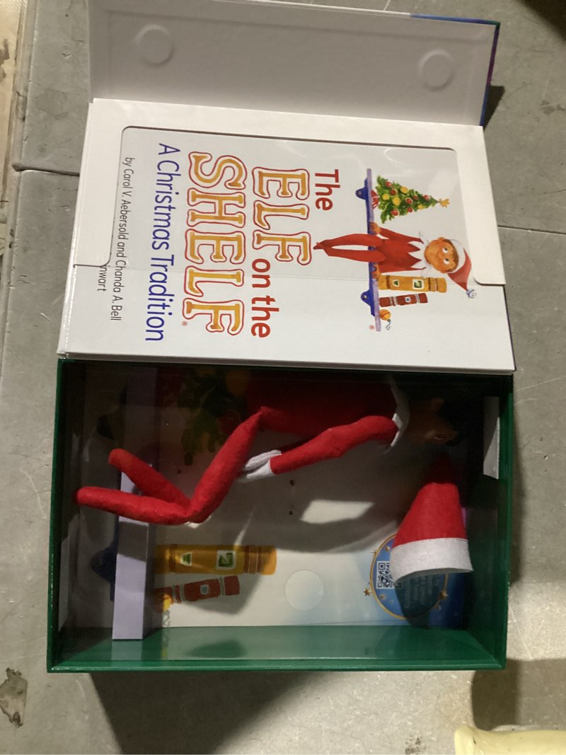 Condition photo showing Good Condition for The Elf on the Shelf: A Christmas Tradition - Boy Scout Elf with Brown Eyes - Includes Artfully Illustrated Storybook, Keepsake Box and Official Adoption Certificate Brown-eyed Boy