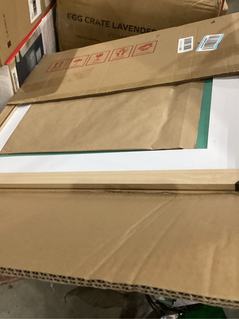 Condition photo showing New/Like New for LaVie Home 20x24 Picture Frame Beige Oak Wood Poster Frame, Display Pictures 16x20 with Mat or 20x24 Without Mat, Stable Frame and Polished Plexiglass, Horizontal and Vertical Format of The Walls 20x24 Beige Oak