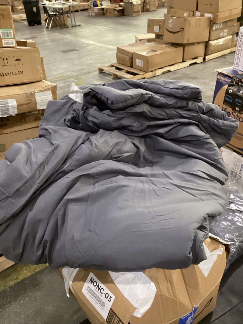 Comforter with bed sheet (product info unknown )