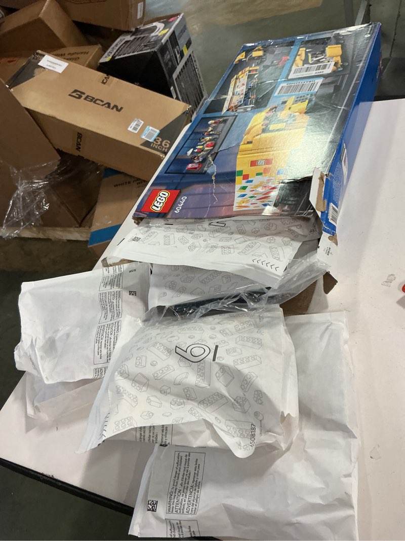 Condition photo showing Good Condition for LEGO City Yellow Delivery Truck Toy, Comes with a Semitruck Model, Forklift and 4 Minifigures for Pretend Play, Fun Birthday Gift Idea for Kids' 8 Years Old and Up, 60440