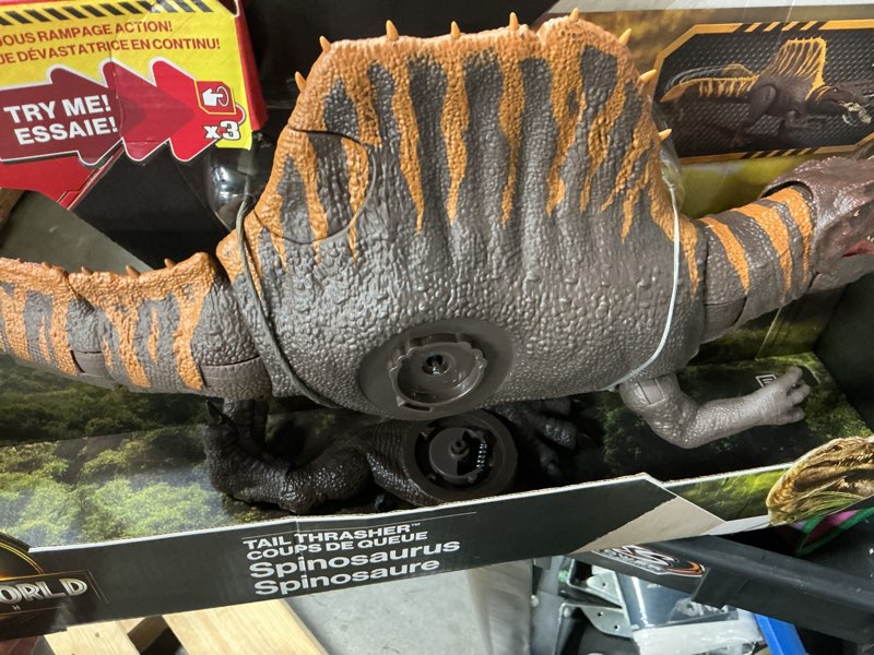 Condition photo showing As Is for jurassic world rebirth tail thrasher spinosaurus action figure, dinosaur toy with 2 attack moves