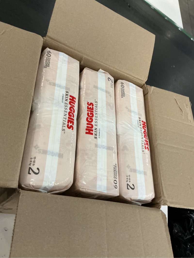 Condition photo showing New/Like New for huggies size 2 diapers, skin essentials baby diapers, size 2 (12-18 lbs), 26 count, packaging may vary size 2 26