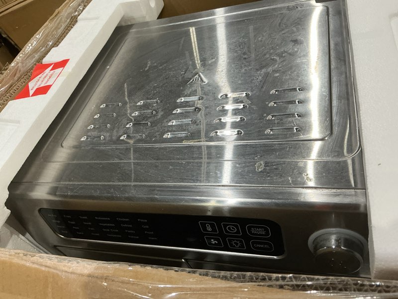 Condition photo showing As Is for dan - emeril lagasse extra large french door air fryer toaster oven combo, 24 cooking functions and digital controls, 7 accessories included, stainless steel finish, 26qt capacity