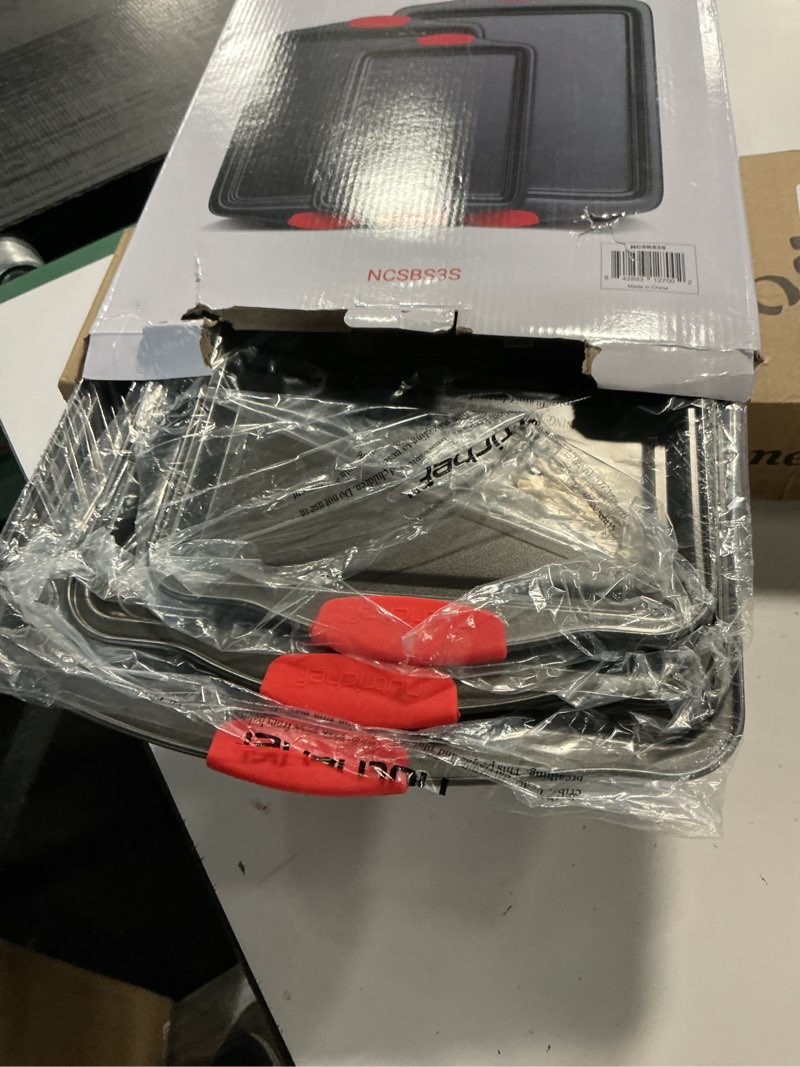 Condition photo showing Good Condition for NutriChef 3-Piece Nonstick Kitchen Oven Baking Pans - Premium & Stylish Non-Stick Steel, Commercial Grade Restaurant Quality Metal Bakeware with Red Silicone Handles - Easy to Clean, NCSBS3S