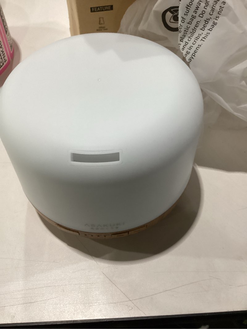 Condition photo showing New/Like New for asakuki essential oil diffuser for home, 500ml aromatherapy diffuser humidifier with remote control, 7 color led lights, quiet cool mist diffuser for bedroom, living room, office (yellow)