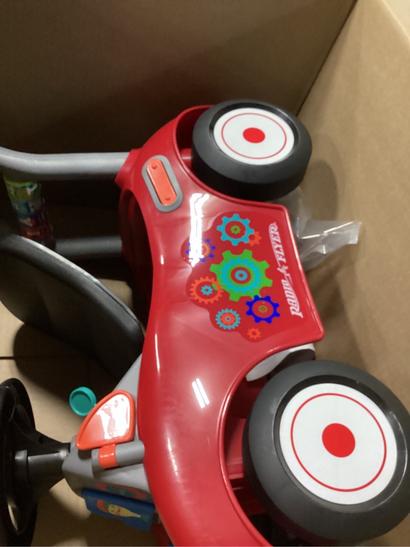 Condition photo showing Good Condition for radio flyer busy buggy, for toddlers 1-3, 3-in-1 push walker ride on car with 17 sensory activities, anti-tip feature, under-seat storage, horn and gears, 42 lb capacity, toddler ride on toys red