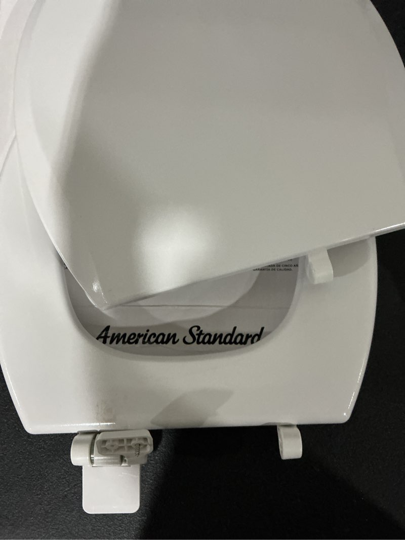 Condition photo showing As Is for american standard bedminster wood white round soft close toilet seat