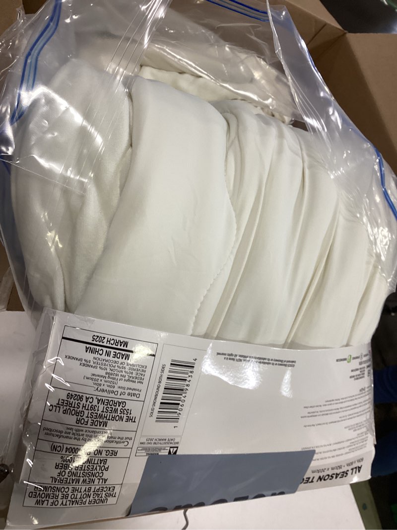 Condition photo showing Good Condition for northwest hgtv cooling throw blanket with dual-sided comfort, lightweight summer blanket with cool-touch jersey knit and warm plush reverse, for bed, couch, or travel, 60 x 80 inches, ivory ivory solid 60" x 80"