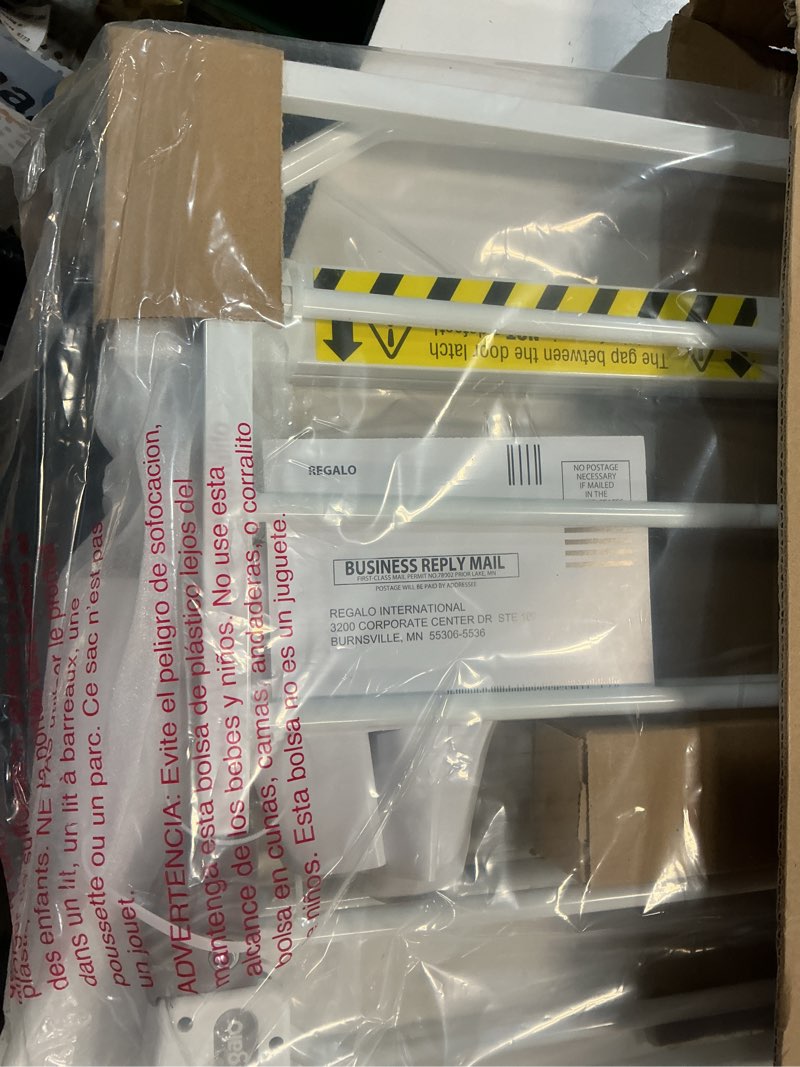 Condition photo showing New/Like New for regalo safety 29-38.5" baby gate for doorways & bottom of stairs, pressure mounted baby gate with door for babies, toddlers & pets, tested & safe for 30 years, american designed, american owned, white white 29-38.5"w x 30"h