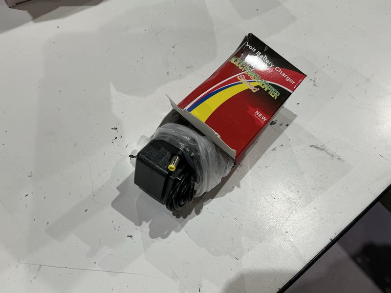 Condition photo showing As Is for 12 volt battery charger for kids ride on toys car 12v powered wheel charger for best choice products wrangler suv kid trax dynacraft bumper car jeep toy kidzone kids electric toys charger 12v charger