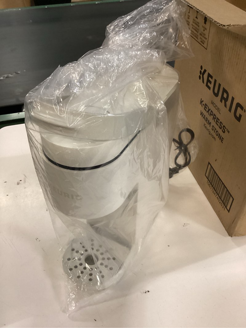 Condition photo showing As Is for Keurig K-Express Single Serve K-Cup Pod Coffee Maker, 3 Brew Sizes, Strong Button Feature, 42oz Removable Reservoir, Warm Stone