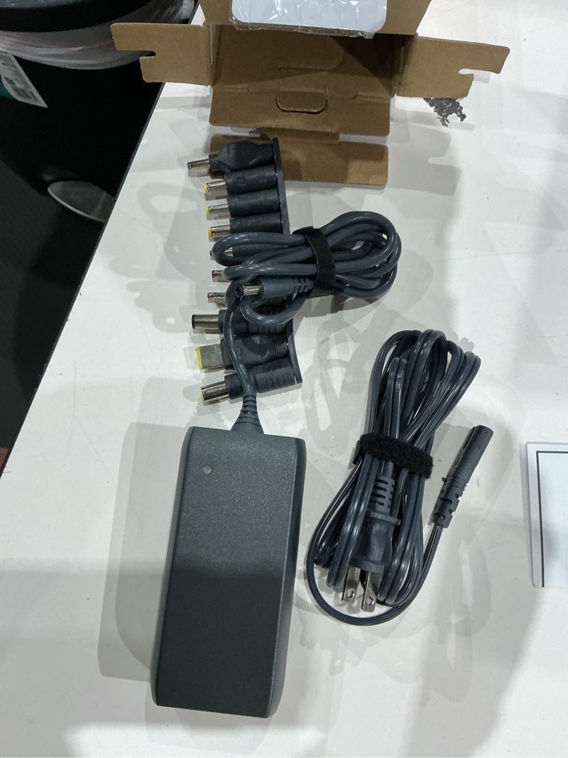 Condition photo showing Good Condition for onn 90w laptop charger with 10 interchangeable tips, 10ft power cord, for hp, dell, lenovo, grey