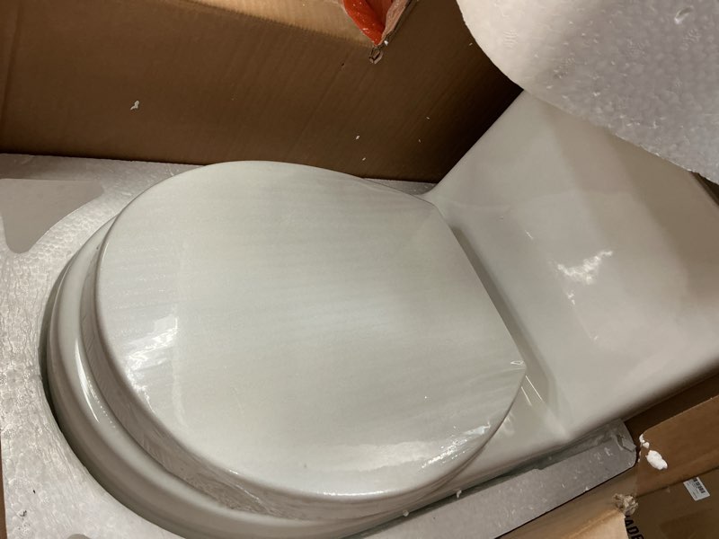 Condition photo showing As Is for One-Piece Toilet, Dual Flush 0.8/1.28 GPF Water-Saving Design, ADA Comfort Height, Ceramic Bowl, 12-Inch Rough-In for Easy Installation 17.5" Height & Dual Flush White Elongated Bowl