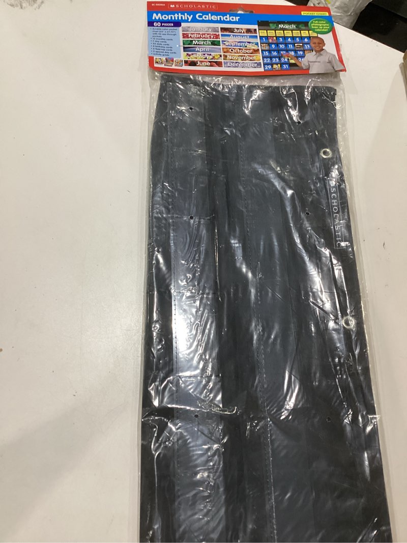 Condition photo showing New/Like New for pocket chart monthly calendar (black)