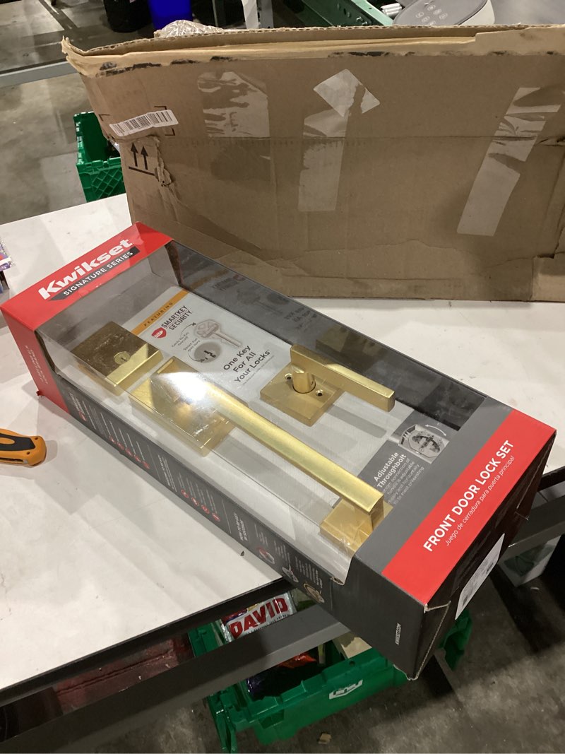 Condition photo showing New/Like New for Kwikset San Clemente Front Door Lock Handle and Deadbolt Set, Entry Handleset Exterior with Interior Reversible Lever, Satin Brass, Pick Resistant SmartKey Deadbolt Security, with Microban Protection Satin Brass With Handle Keyed Entry