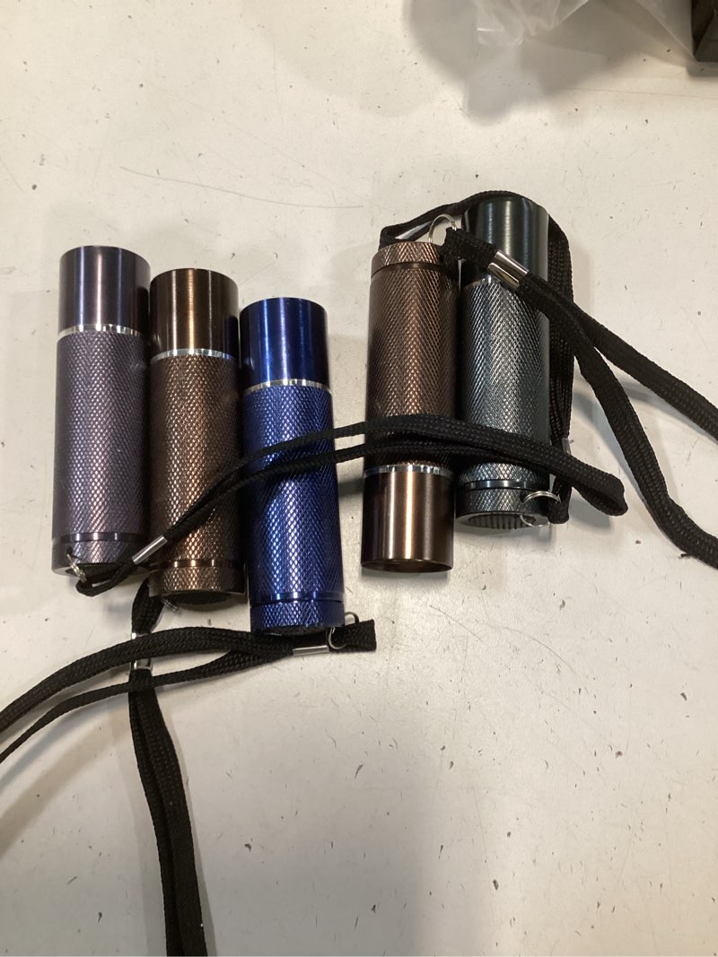 Condition photo showing As Is for 5 pack mini flashlights