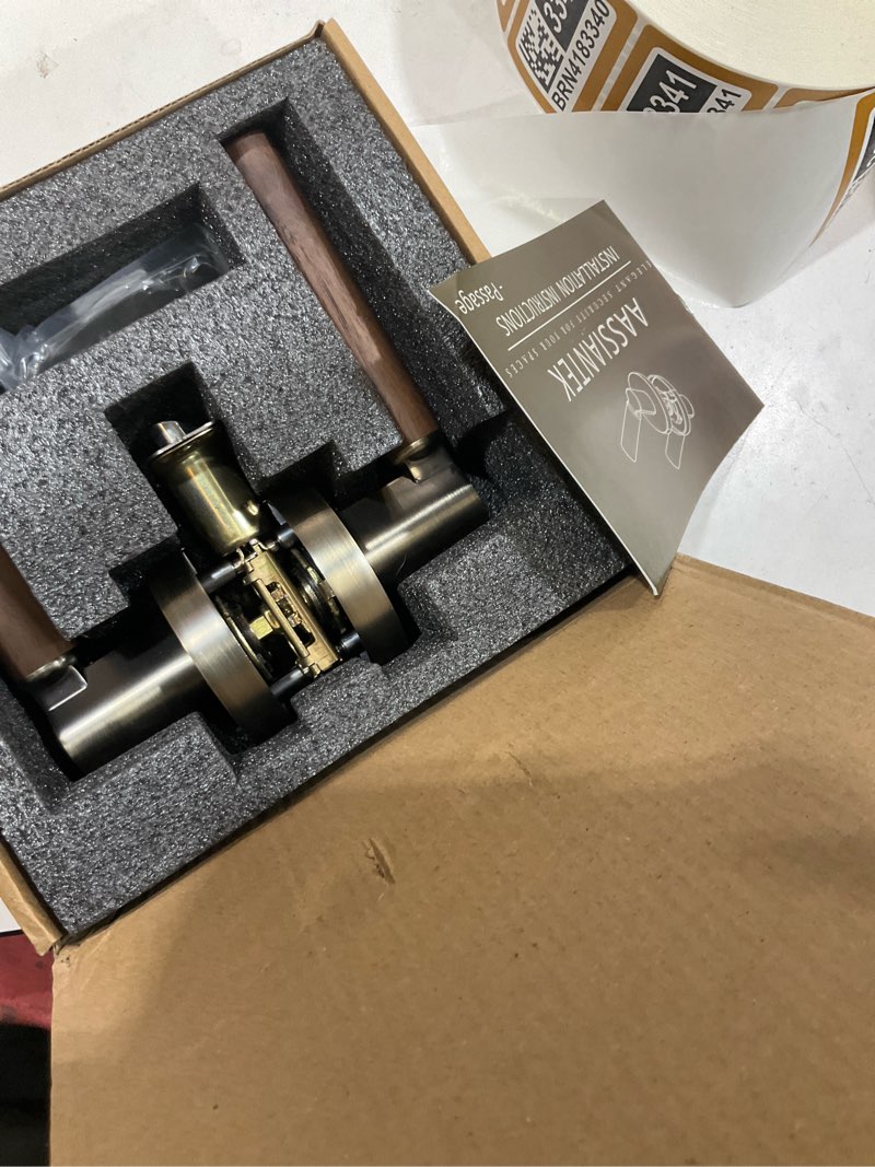 Condition photo showing Good Condition for walnut wood keyless door lever (1 pack, antique brass, passage) | round knob locksets for hallway and closet room door handle zinc alloy base passage 1 pack antique brass