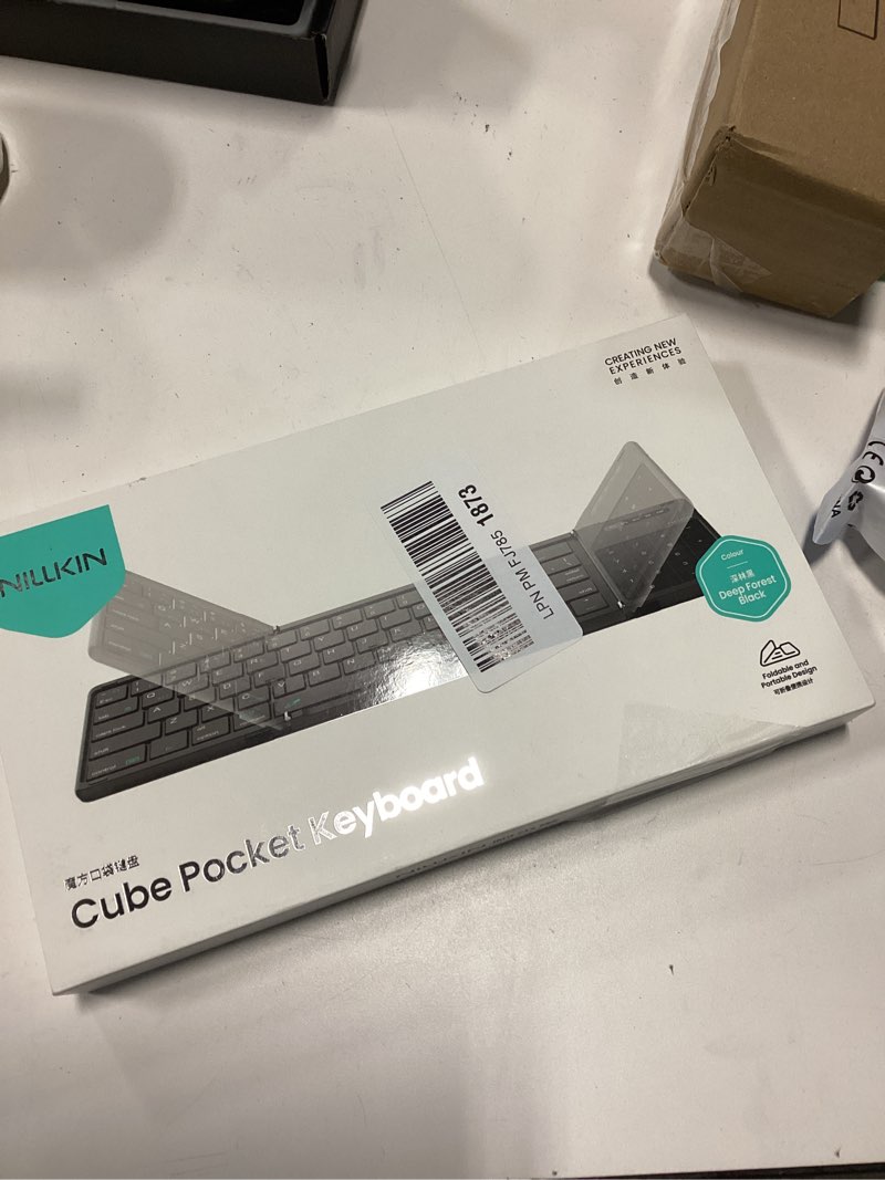 Condition photo showing New/Like New for Nillkin Foldable Travel Keyboard with Touchpad & Number Pad, Bluetooth Wireless Portable Folding Full Size Keyboard with Trackpad for PC Laptop iPad Tablets Smartphone, Silicone Leather Cover, Black