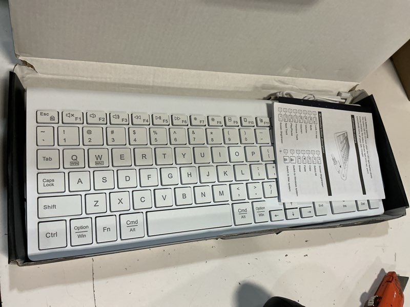 Condition photo showing Good Condition for sablute wireless keyboard with 7 colored backlits, rechargeable silent compact cordless computer keyboard with low profile quiet light up keys for windows, pc, linux, chrome, mac (white)