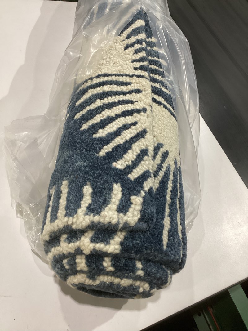 Condition photo showing Good Condition for nicole miller new york kendall fluted geo handcrafted area rug, 100% wool rug, navy blue, 8'x10' navy blue 8' x 10' (rectangular)