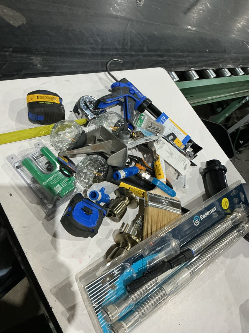 Condition photo showing As Is for assorted home improvement lot (small tools, screw, home accessories, etc.)