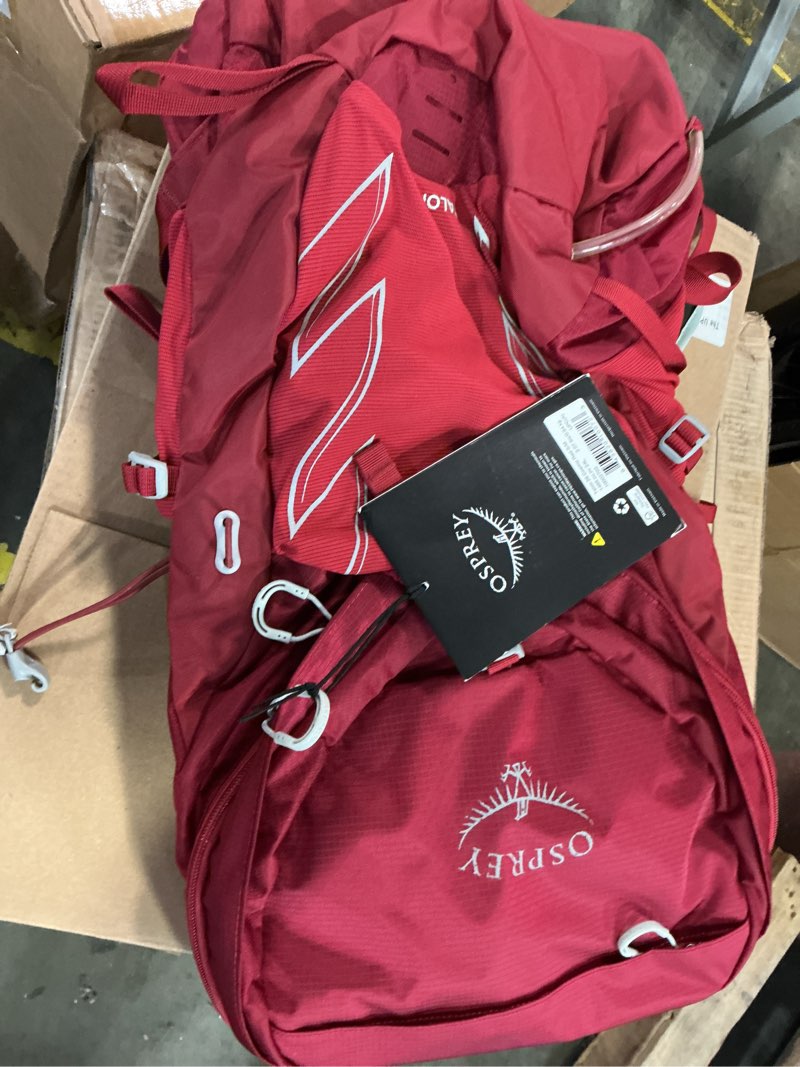 Condition photo showing Good Condition for osprey 10002702 talon 26 cosmic red s/m