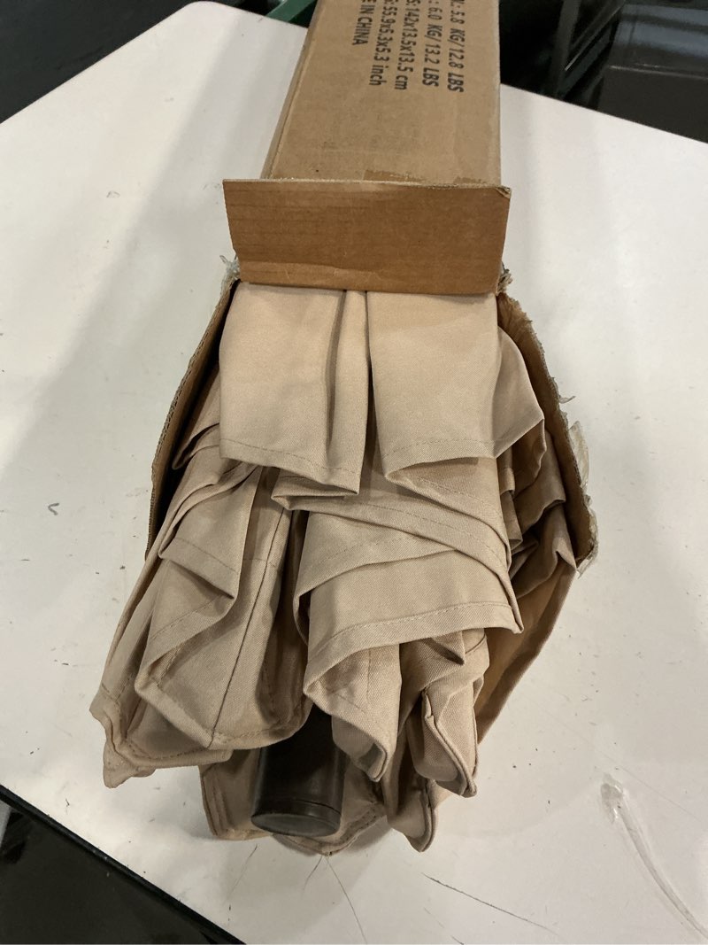 Condition photo showing Good Condition for PatioKingdom 9FT Patio Umbrella Outdoor with Auto-Tilt Crank & 8 Sturdy Fiberglass Ribs,Market Table Umbrella for Pool,Backyard,Deck and Garden,Beige