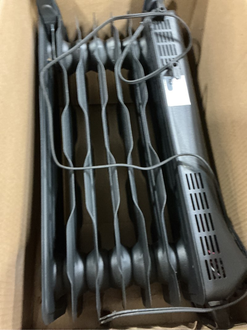 Condition photo showing Good Condition for Amazon Basics Oil Space Heater, Portable Radiator Heater with 7 Oil-Filled Fins for Indoor Use, 3 Heat Settings, Thermostat, Tip-Over Protection, ETL Safety Certificate, Manual Control, 1500W, Black