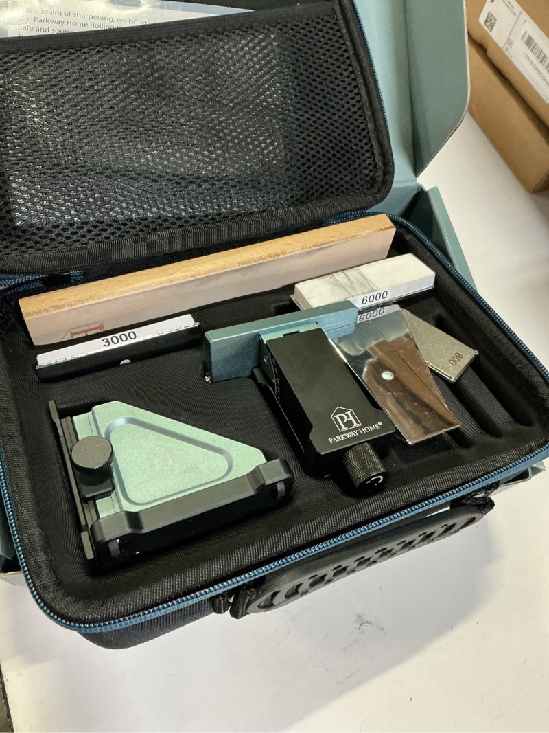 Condition photo showing As Is for patented original adjustable rolling knife sharpener kit: adjustable height, 30 angle options, 5 removeable whetstone plates, leather strop with travel case - kitchen knife sharpener sharpener & 5 whetstone plates & leather strop