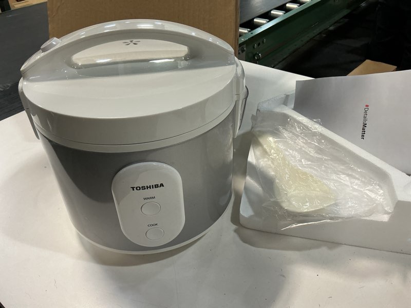 Condition photo showing Good Condition for TOSHIBA Rice Cooker & Steamer Simple 5.5 Cup(Uncooked) with Steaming Basket, Removable Non-Stick Inner Pot & Inner Lid, for Soups, Stews, Grains&Oatmeal, One Touch&Keep Warm Function, Silvery White Simple_5.5 Cups