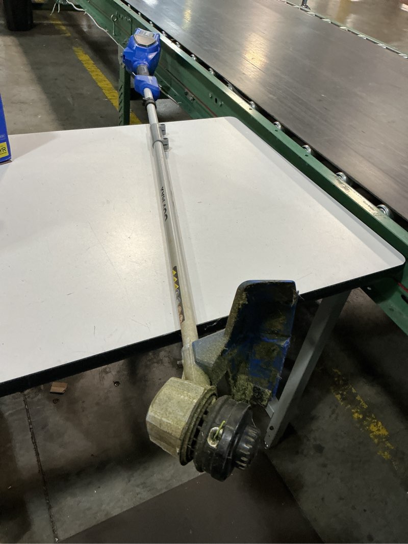 Condition photo showing As Is for kobalt 24-volt 15-in split shaft attachment capable battery string trimmer 4.0 ah (battery included) (charger included)