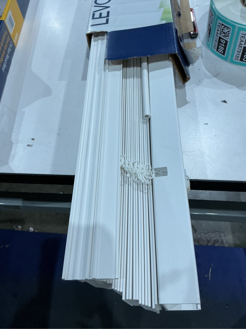 Condition photo showing As Is for levolor trim+go 2-in slat width 34-in x 64-in cordless white faux wood room darkening horizontal blinds