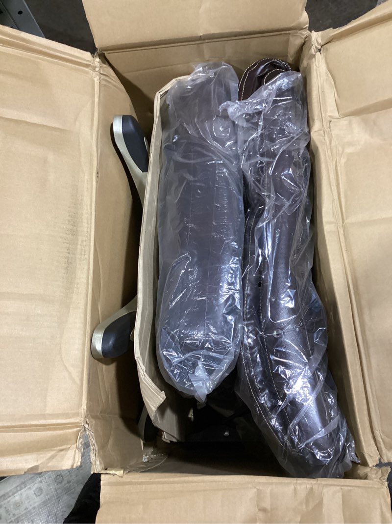 Condition photo showing As Is for amazon basics executive high back office chair, adjustable height, tilt, swivel, padded armrests, brown/gold