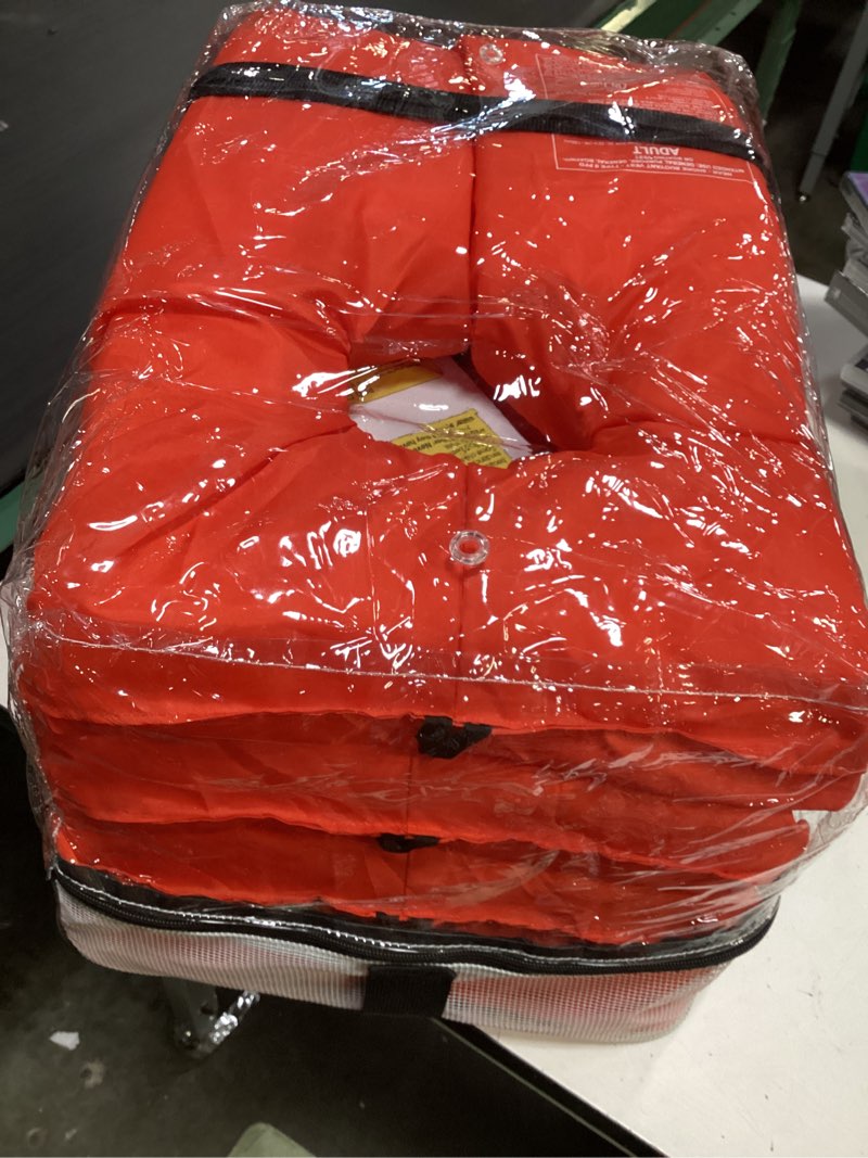 Condition photo showing Good Condition for ozark trail 4-pack adult type ii life vest, includes storage bag, orange